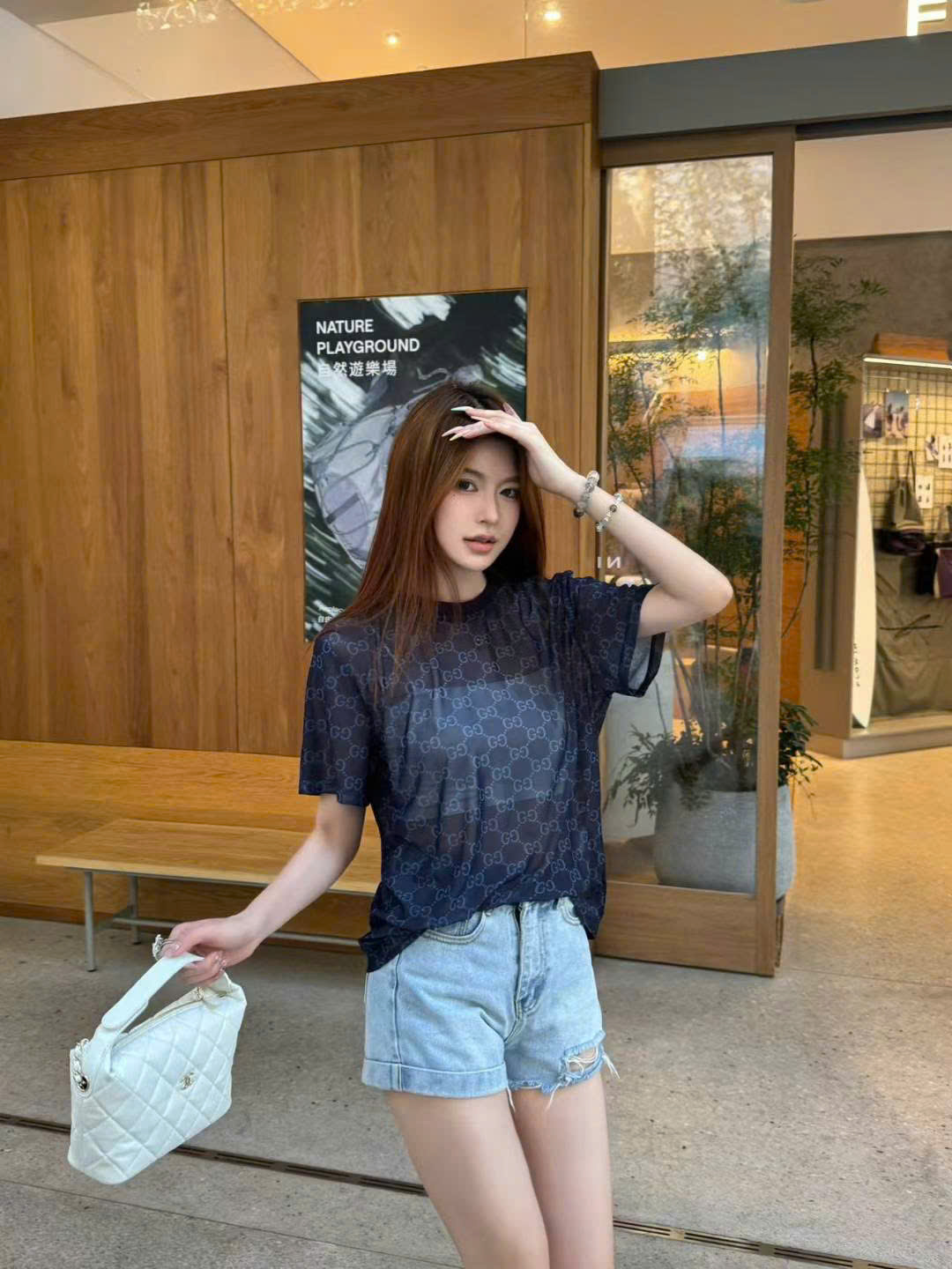 Áo phông xanh navy nữ Gucci 7