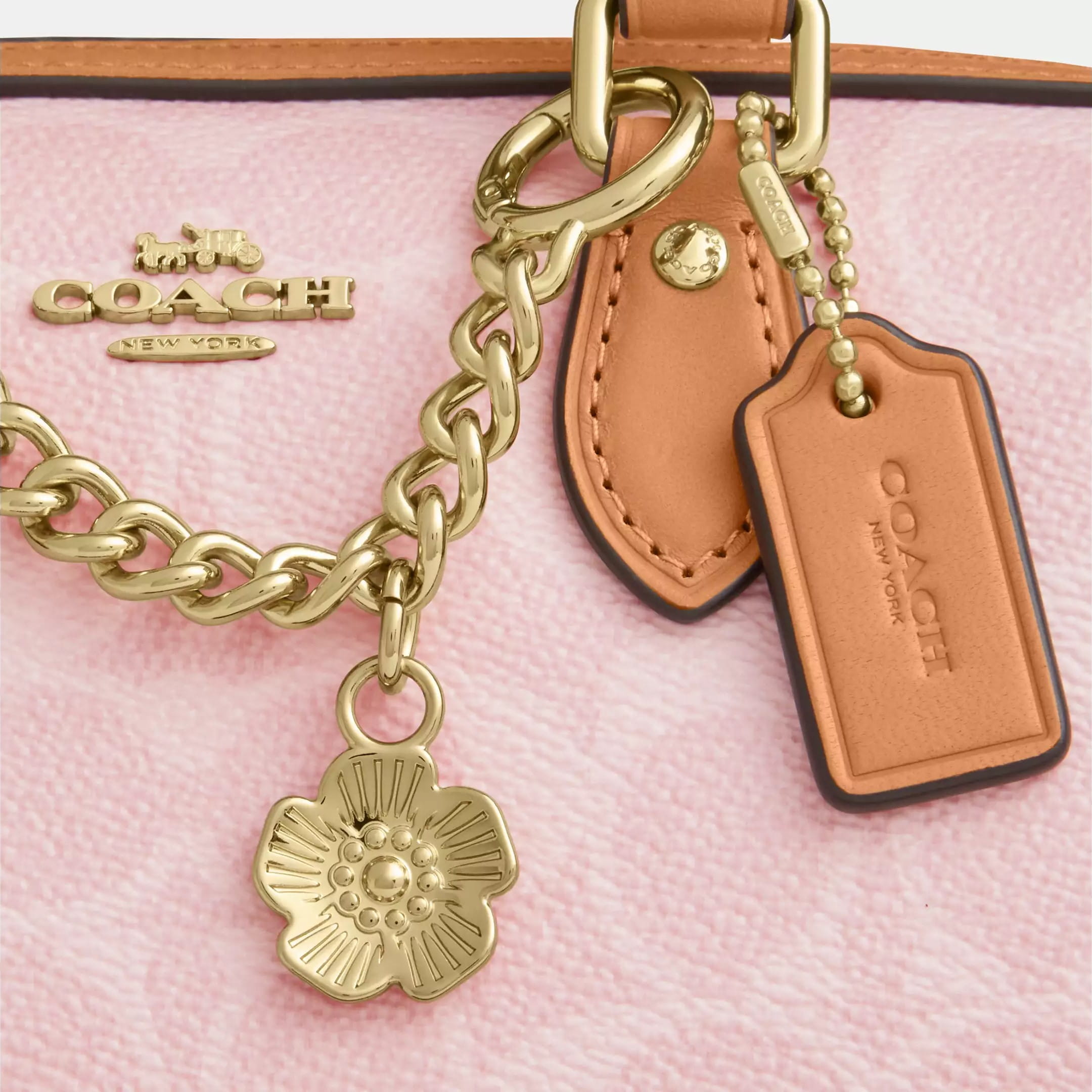 Túi Coach Mini Rowan Crossbody Bag In Signature Canvas With Charms Powder Pink CEK79 2