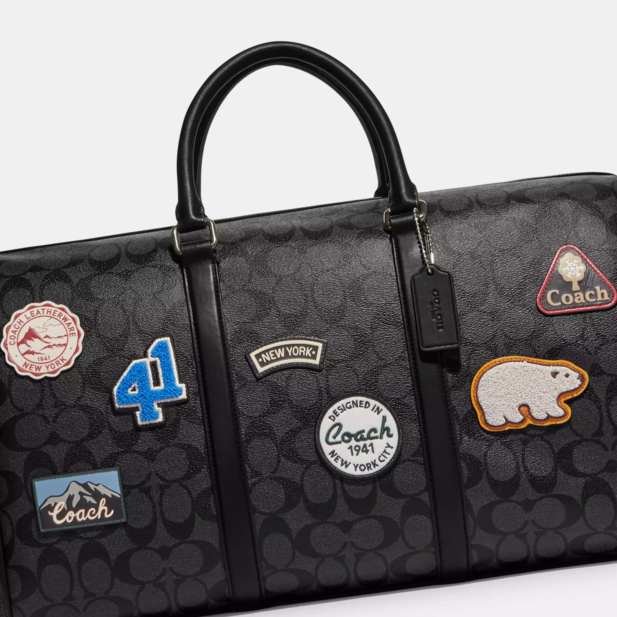 TÚI XÁCH DU LỊCH COACH VENTURER BAG IN SIGNATURE CANVAS WITH SKI PATCHES CE553 2