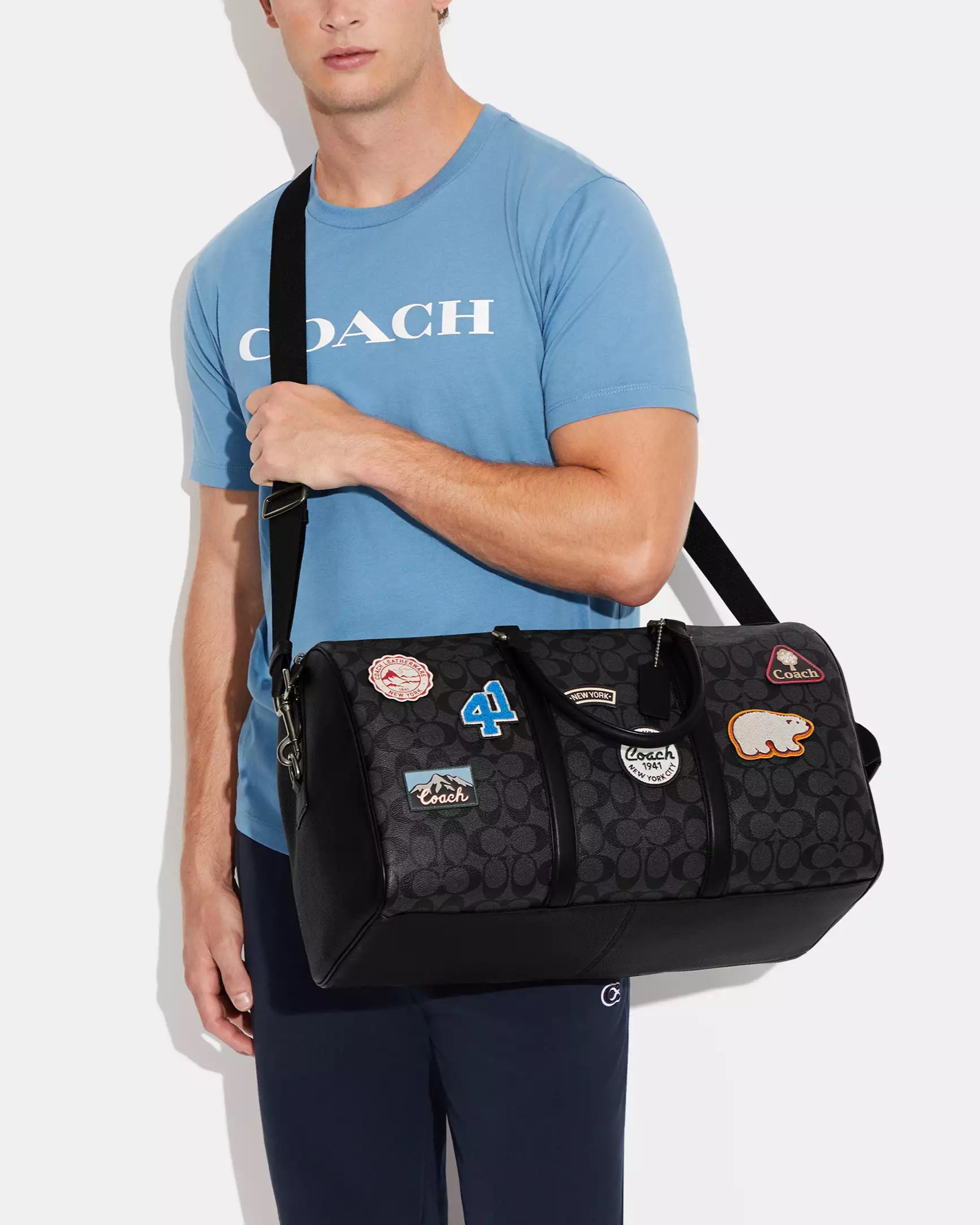 TÚI XÁCH DU LỊCH COACH VENTURER BAG IN SIGNATURE CANVAS WITH SKI PATCHES CE553 3
