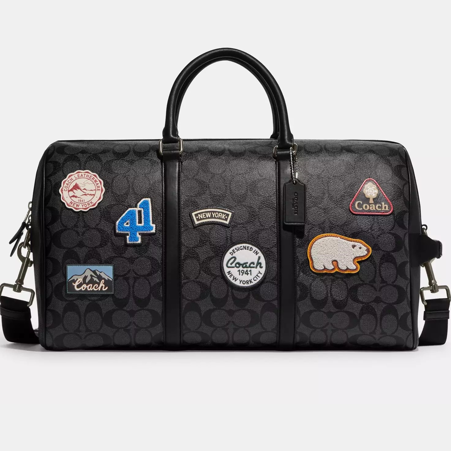 TÚI XÁCH DU LỊCH COACH VENTURER BAG IN SIGNATURE CANVAS WITH SKI PATCHES CE553 6