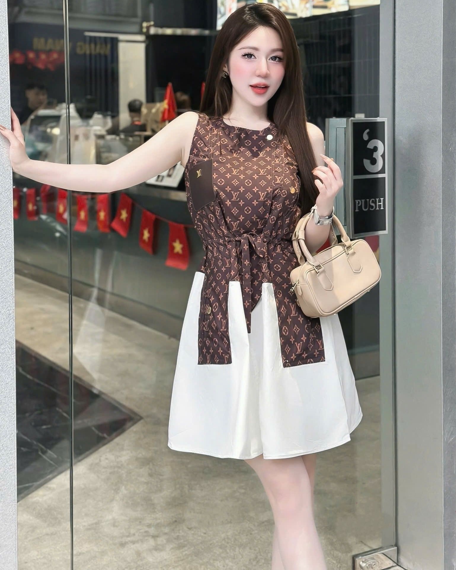 Đầm xòe phối màu sát nách LV 10