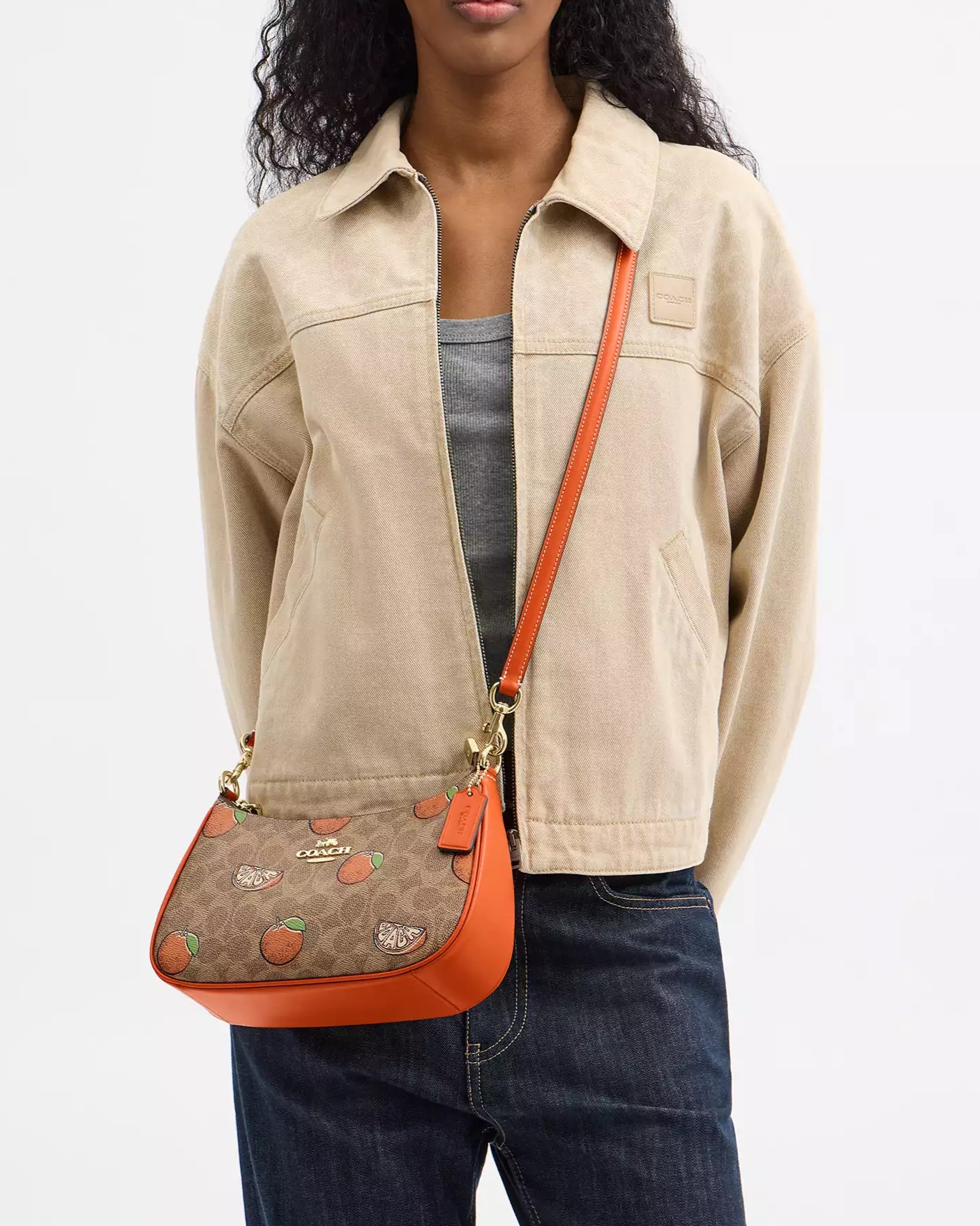 Túi kẹp nách Coach Teri Shoulder Bag In Signature Canvas With Orange Print CAL80 9