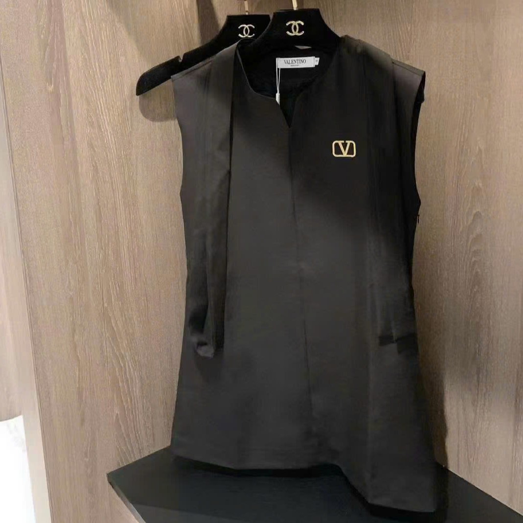Áo đầm đen ngắn thắt nơ Valentino 9