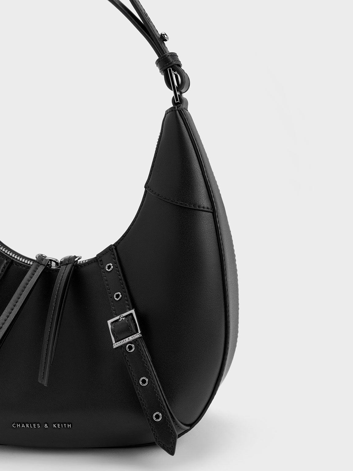 TÚI KẸP NÁCH CNK CHARLES KEITH GROMMET CRESCENT HOBO BAG NOIR CK2-41200031 1