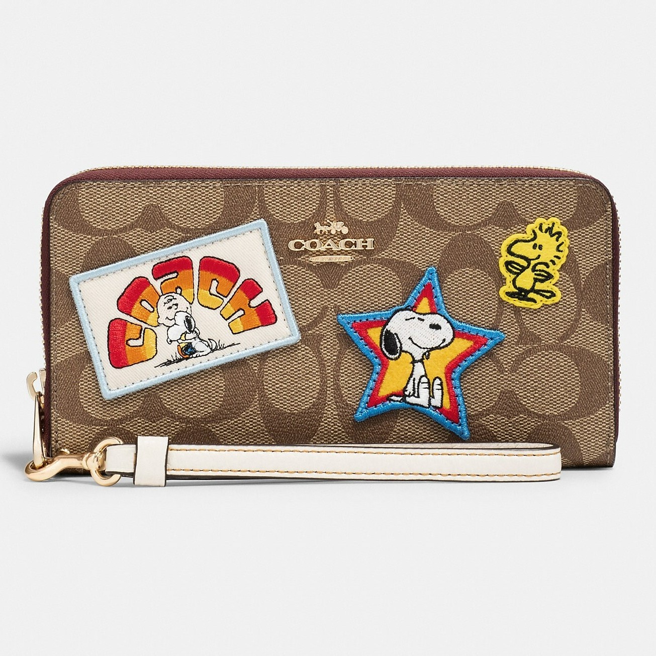 VÍ DÀI COACH X PEANUTS LONG ZIP AROUND WALLET IN SIGNATURE CANVAS WITH VARSITY PATCHES 1
