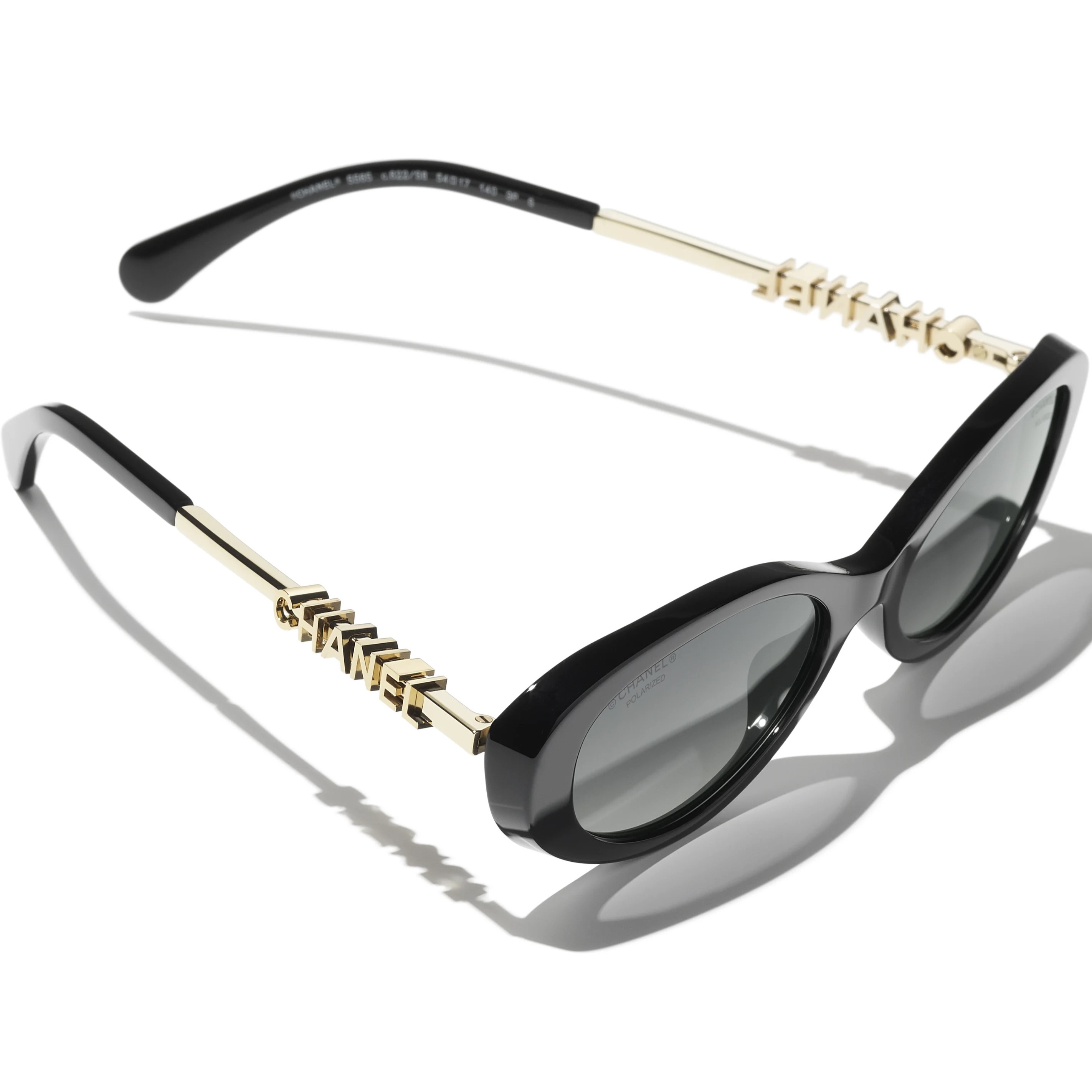 Mắt kính Chanel Oval Sunglasses Black 5565 9