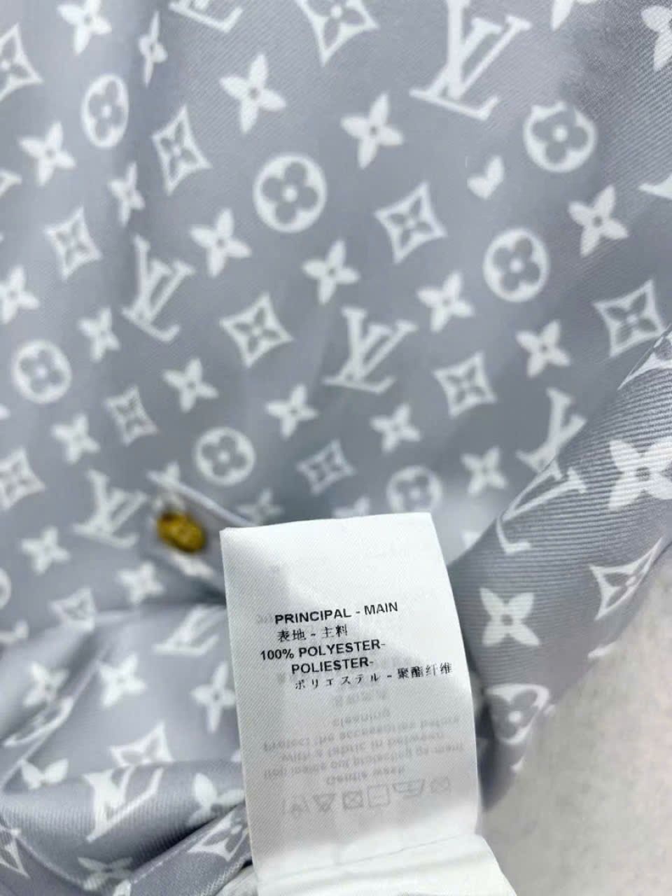 Áo đầm nữ Louis Vuitton xanh nhạt logo dệt nổi 1