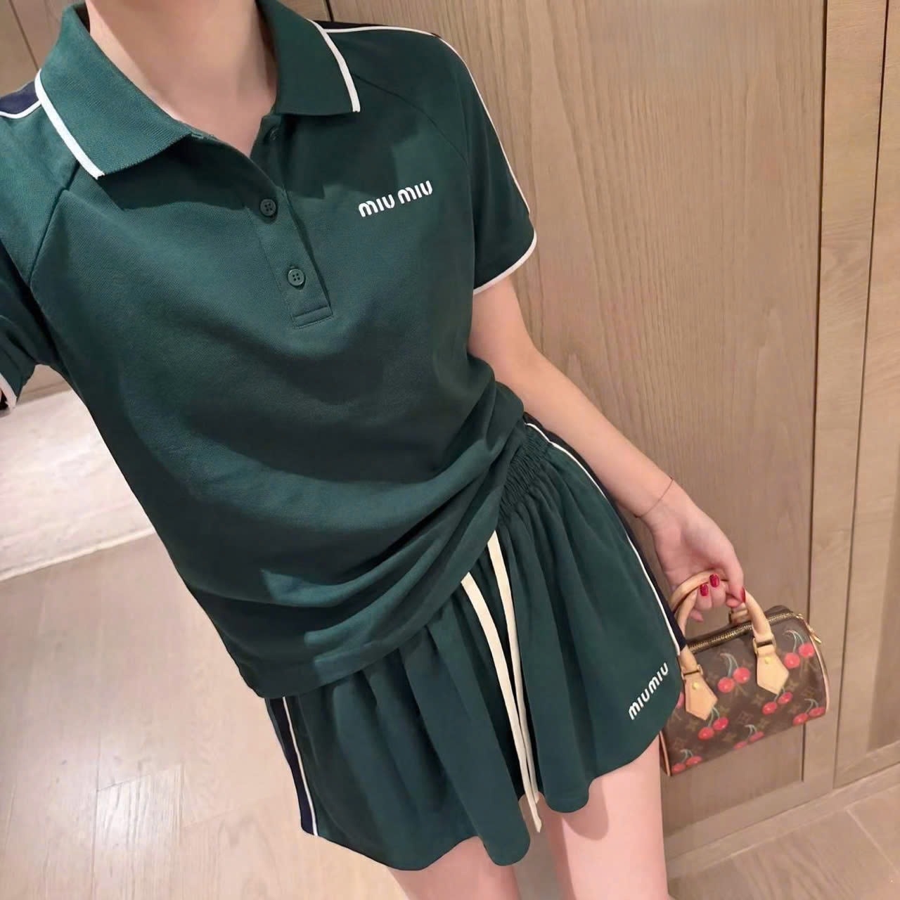 Set áo có cổ váy xếp ly thun xanh lá Miu Miu 1