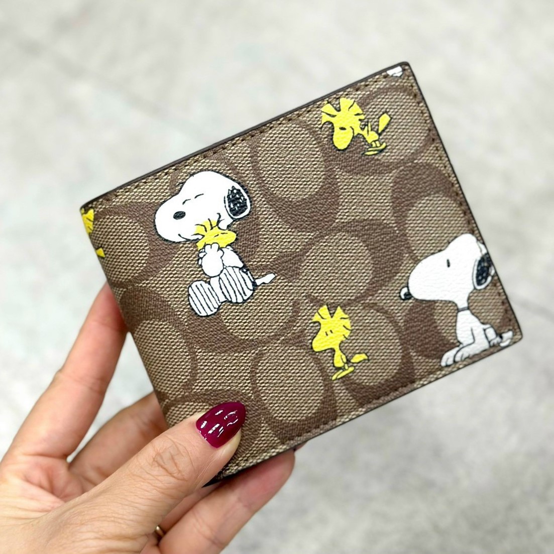 VÍ NGẮN NAM COACH X PEANUTS 3 IN 1 WALLET IN SIGNATURE CANVAS WITH SNOOPY WOODSTOCK PRINT CE714 1