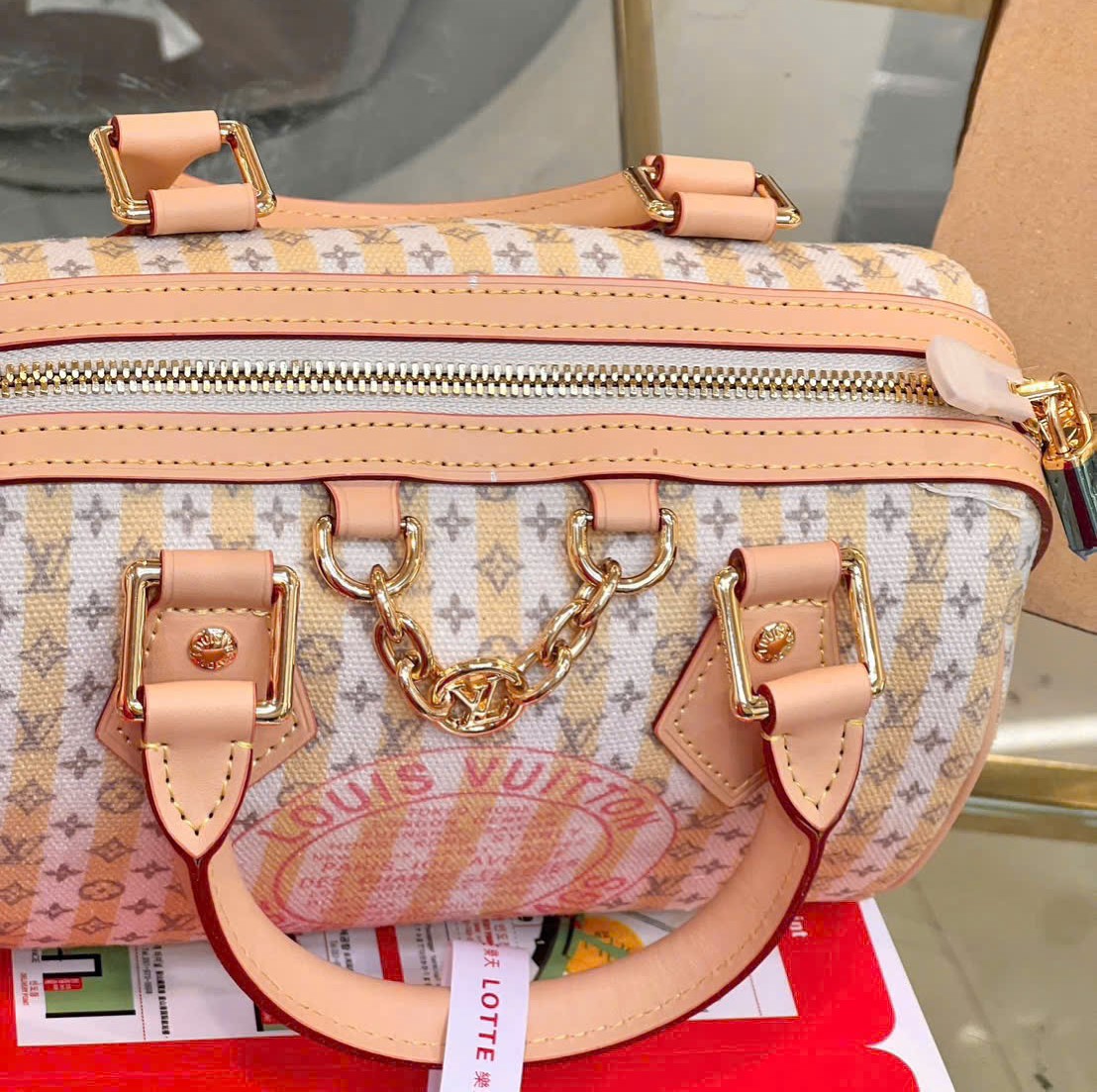 Túi trống Louis Vuitton Speedy Bandoulière 20 LV Stamp Nude Rose 9