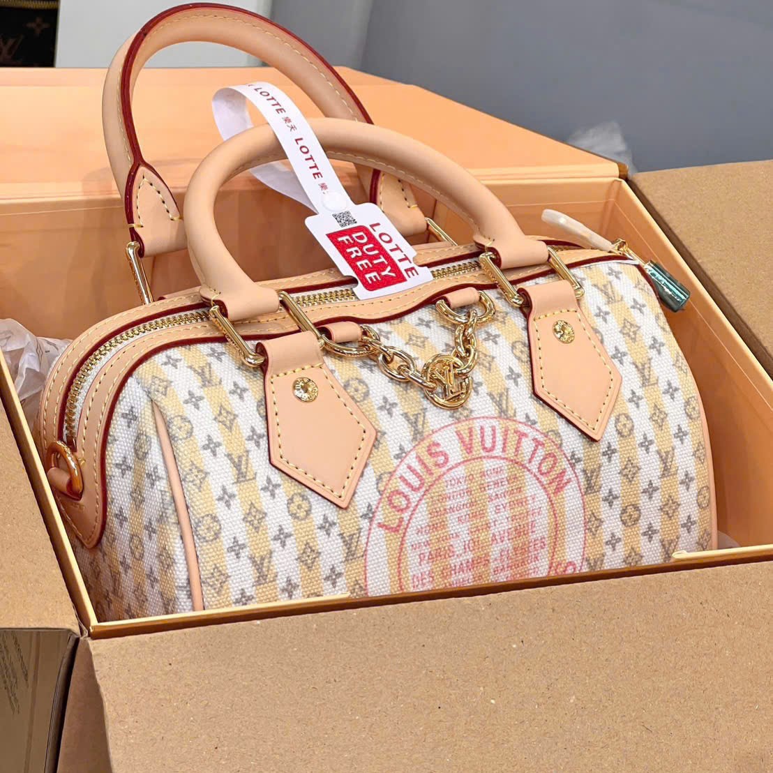 Túi trống Louis Vuitton Speedy Bandoulière 20 LV Stamp Nude Rose 10