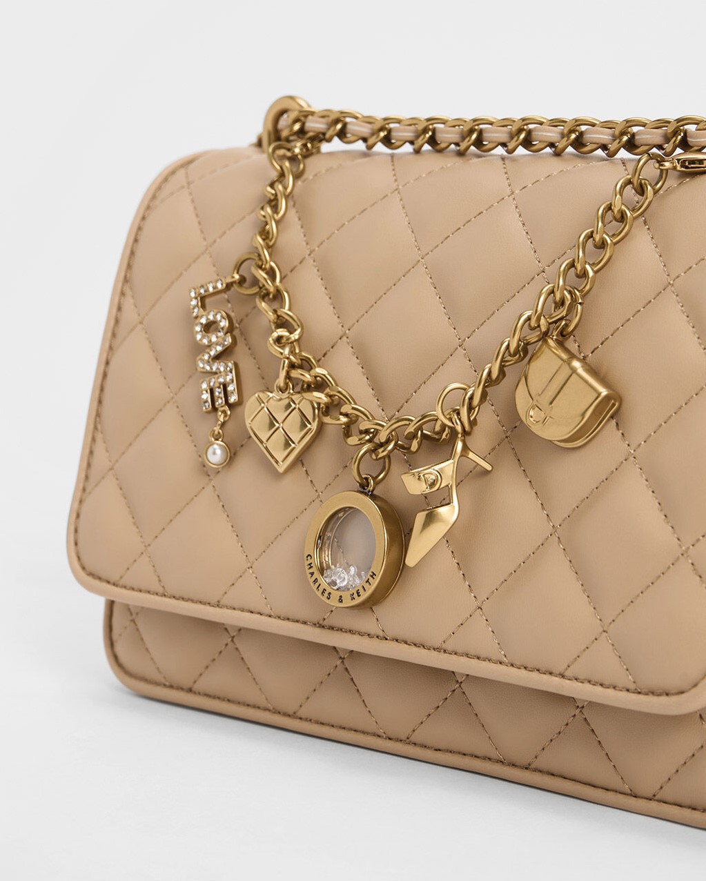 TÚI ĐEO CHÉO CHARLES AND KEITH CHARM EMBELLISHED QUILTED CLUTCH 6