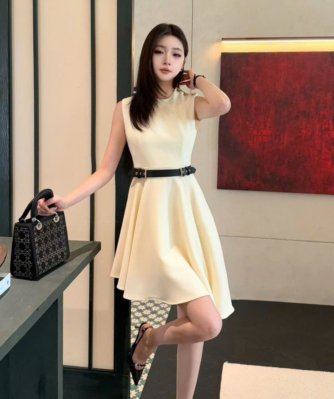 Đầm nữ LV khuy dập nổi logo 7