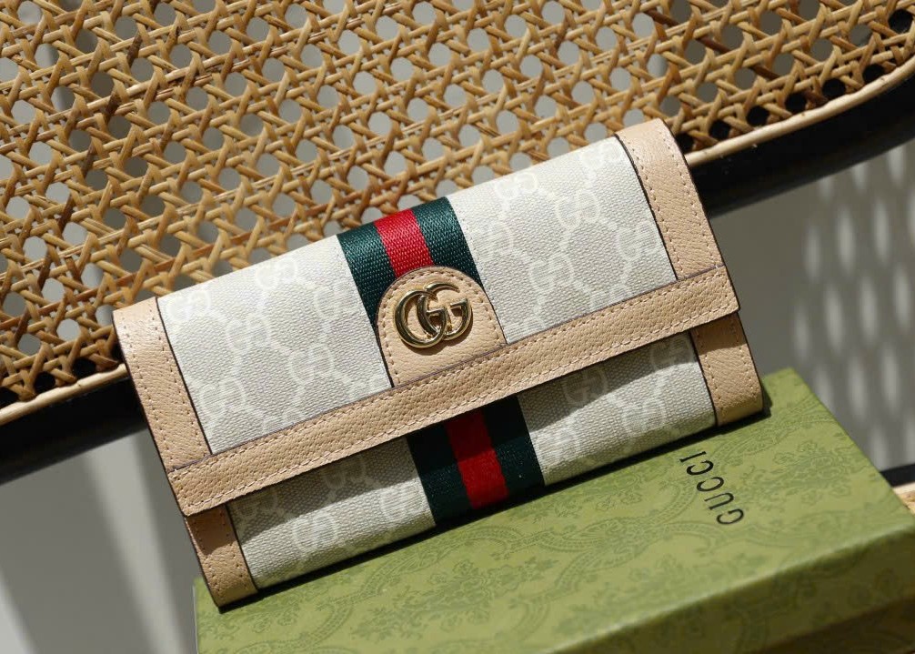 VÍ NỮ DÀI GUCCI OPHIDIA GG CONTINENTAL WALLET WITH BEIGE AND WHITE GG SUPREME CANVAS 1